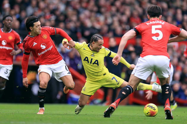 Manchester United, ManU v Tottenham Hotspur 07 February 2026 Manchester - Premier League football - Manchester United v Tottenham Hotspur - Xavi Simons of Tottenham Hotspur falls as he is challenged by Lisandro Martinez of Manchester United - (Photo by Simon Stacpoole) Manchester UK Copyright: xSimonxStacpoolexOffside