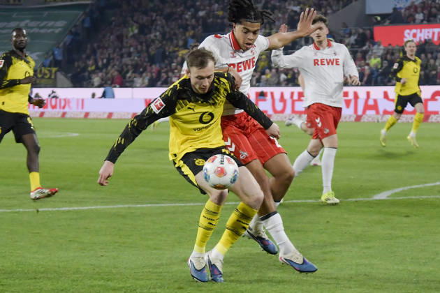 v. li. im Zweikampf Maximilian Beier (Dortmund 14) Jahmai Simpson-Pusey (Koeln 22) 07.03.2026¢ Fussball ¢ 1. FC Koeln vs Borussia Dortmund , Rheinenergiestadion, Koeln, DFB DFL REGULATIONS PROHIBIT ANY USE OF PHOTOGRAPHS AS IMAGE SEQUENCES AND OR QUASI-VIDEO
