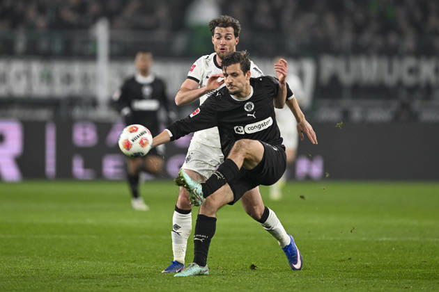 v. li. im Zweikampf Joe Scally (Moenchengladbach 29) Adam Dzwigala (Pauli 25) 13.03.2026 ¢ Fussball ¢ Borussia Moenchengladbach vs FC St. Pauli, Borussia-Park, Moenchengladbach, DFB DFL REGULATIONS PROHIBIT ANY USE OF PHOTOGRAPHS AS IMAGE SEQUENCES AND OR QUASI-VIDEO