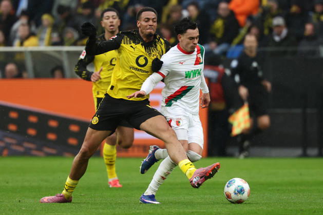 Dortmund, Germany, 14.03.26, Felix Nmecha (Borussia Dortmund) und Fabian Rieder (FC Augsburg) im Zweikampf während des Spiels der 1. Bundesliga zwischen Borussia Dortmund - FC Augsburg im Signal Iduna Park in Dortmund. (Photo by Joachim Bywaletz) DFB DFL REGULATIONS PROHIBIT ANY USE OF PHOTOGRAPHS AS IMAGE SEQUENCES AND OR QUASI-VIDEO. Copyright: JoachimxBywaletz xJB-Sportfoto
