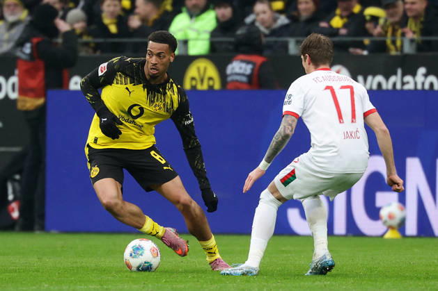 Dortmund, Germany, 14.03.26, Felix Nmecha (Borussia Dortmund) und Kristijan Jakic (FC Augsburg) im Zweikampf während des Spiels der 1. Bundesliga zwischen Borussia Dortmund - FC Augsburg im Signal Iduna Park in Dortmund. (Photo by Joachim Bywaletz) DFB DFL REGULATIONS PROHIBIT ANY USE OF PHOTOGRAPHS AS IMAGE SEQUENCES AND OR QUASI-VIDEO. Copyright: JoachimxBywaletz xJB-Sportfoto