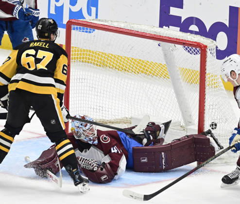 Pittsburgh Penguins right wing Rickard Rakell (67) scores on Colorado Avalanche goaltender Scott Wedgewood (41) in the third period of the Pittsburgh Penguins 6-2 lost at PPG Paints Arena in Pittsburgh on Tuesday, March 24, 2026. PIT2026032421 ARCHIExCARPENTER