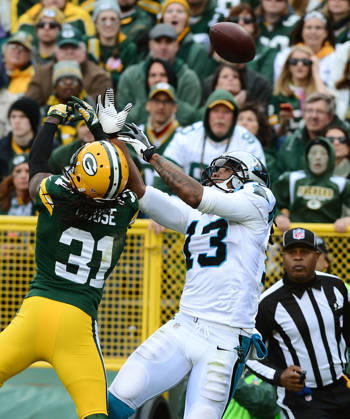 Oct. 19, 2014 - Green Bay, WI, USA - Green Bay Packers cornerback Davon House (31) breaks up a pass meant for Carolina Panthers wide receiver Kelvin Benjamin (13) in the end zone during the fourth quarter on Sunday, Oct. 19, 2014, at Lambeau Field in Green Bay, Wis. Copyright: xJeffxSinerx