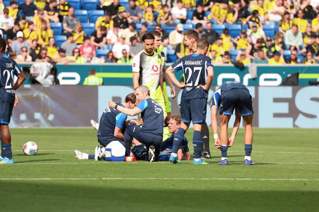 18.04.2026, xrekx, Fussball 1.Bundesliga, TSG 1899 Hoffenheim - Borussia Dortmund v.l. Wouter Burger (TSG 1899 Hoffenheim) verletzt, Verletzung, Schmerz, Schmerzen, injured, injury, pain, pains (DFL DFB REGULATIONS PROHIBIT ANY USE OF PHOTOGRAPHS as IMAGE SEQUENCES and or QUASI-VIDEO) Sinsheim