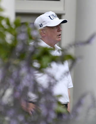 October 14, 2017 - Washington, District of Columbia, United States of America - United States President Donald J. Trump in the First Lady s garden of the White House in Washington, DC following a round of golf with US Senator Lindsey Graham (Republican of South Carolina) on Saturday, October 14, 2017..Credit: Ron Sachs Pool via CNP Copyright: xRonxSachs CNPx