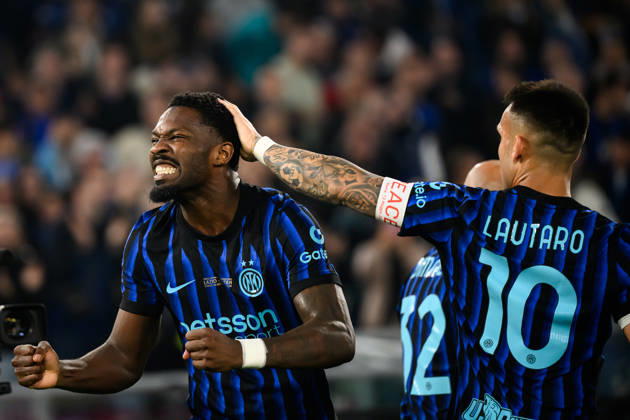 Marcus Thuram of FC Internazionale celebrates with Lautaro Martinez after scoring the goal of 0-1 during the 2025 2026 Coppa Italia football final between SS Lazio and FC Internazionale at Stadio Olimpico in Rome (Italy), May 13, 2026. AndreaxStaccioli