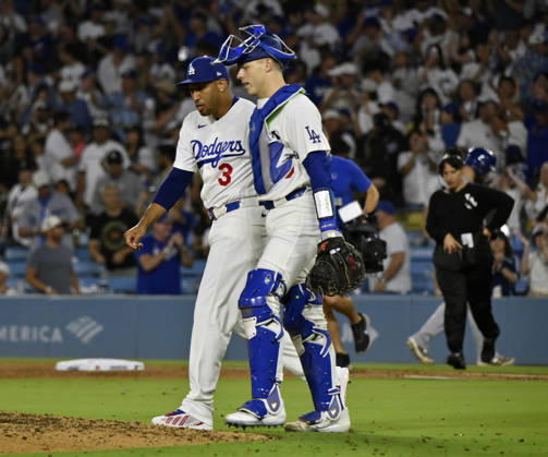 Los Angeles Dodgers closing pitcher Edwin Diaz celebrates with catcher Hunter Feduccia after securing his first save of August , closing out a 6-5 win over the Kansas City Royals after two blown saves in Arizona at Dodger Stadium in Los Angeles on Monday, August 10, 2026. LAP2026081003 JIMxRUYMEN