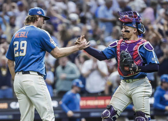 Milwaukee Brewers closing pitcher Trevor Megill (L) and Milwaukee Brewers catcher William Contreras (R) celebrate after the final out in the ninth inning of the MLB, Baseball Herren, USA game between the Atlanta Braves and the Milwaukee Brewers at American Family Field in Milwaukee, Wisconsin on Friday, August 21, 2026. The Brewers defeated the Braves 2-1. MIL20260821829 TANNENxMAURY