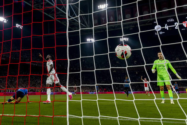 AMSTERDAM AFC Ajax Amsterdam forward Oliver Edvardsen scores the 5 2 goal, whilst AFC Ajax Amsterdam forward Toluwalase Arokodare celebrates his goal during the UEFA Conference League match at the Johan Cruijff ArenA on 27 August 2026 in Amsterdam, the Netherlands. (Photo by DeFodi Images) -