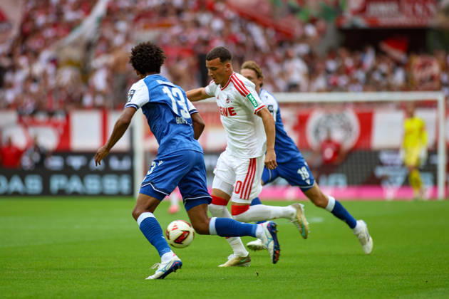 29.08.2026, GER, Fussball, Herren, Bundesliga , 1. Bundesliga, Saison 2026 2027, 1. FC Köln - TSG 1899 Hoffenheim Bernardo (TSG) Said El Mala (KOE) und Tim Lemperle (TSG) im Kampf um den Ball Copyright: xSvenxHanischx