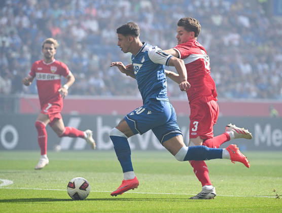 12.09.2026, SNP Arena, Sinsheim, GER, 1.FBL, TSG Hoffenheim vs VfB Stuttgart , Adam Hlozek (Hoffenheim), Ramon Hendriks (Stuttgart) DFL regulations prohibit any use of photographs as image sequences and or quasi-video. (Photo by Hasan Bratic DeFodi Images) -