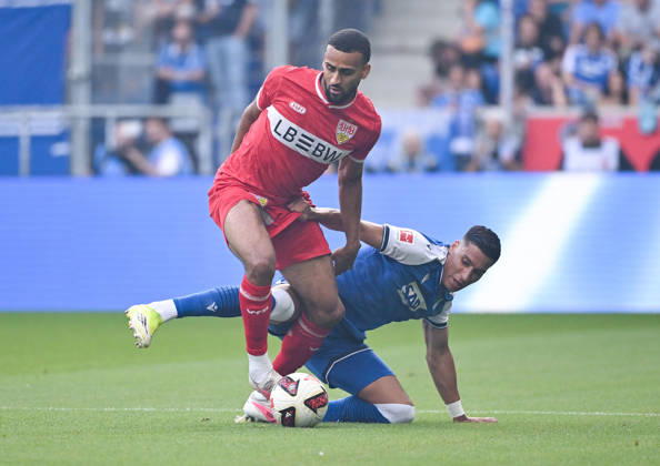 12.09.2026, SNP Arena, Sinsheim, GER, 1.FBL, TSG Hoffenheim vs VfB Stuttgart , Josha Vagnoman (Stuttgart), Adam Daghim (Hoffenheim) DFL regulations prohibit any use of photographs as image sequences and or quasi-video. (Photo by Hasan Bratic DeFodi Images) -