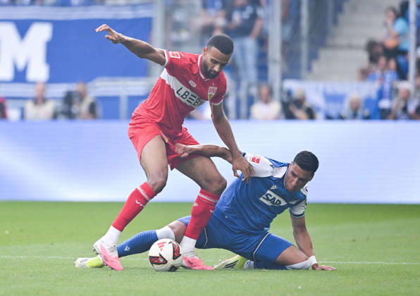 12.09.2026, SNP Arena, Sinsheim, GER, 1.FBL, TSG Hoffenheim vs VfB Stuttgart , Josha Vagnoman (Stuttgart), Adam Daghim (Hoffenheim) DFL regulations prohibit any use of photographs as image sequences and or quasi-video. (Photo by Hasan Bratic DeFodi Images) -