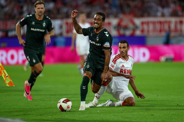 12.09.2026, GER, Fussball, Herren, Bundesliga , 1. Bundesliga, Saison 2026 2027, 1. FC Köln - SV Werder Bremen Arthur (SVW) und Ellyes Skhiri (KOE) im Kampf um den Ball Copyright: xSvenxHanischx