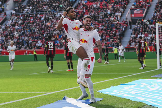 20.09.2026, xjmrgnx, Fussball 1.Bundesliga, Bayer 04 Leverkusen - RB Leipzig v.l. Christopher Nkunku (28, Leipzig) bejubelt seinen aberkannten Treffer zum 1:0 mit Romulo (40, Leipzig) der aber vom VAR aberkannt wird (DFL DFB REGULATIONS PROHIBIT ANY USE OF PHOTOGRAPHS as IMAGE SEQUENCES and or QUASI-VIDEO) Leverkusen
