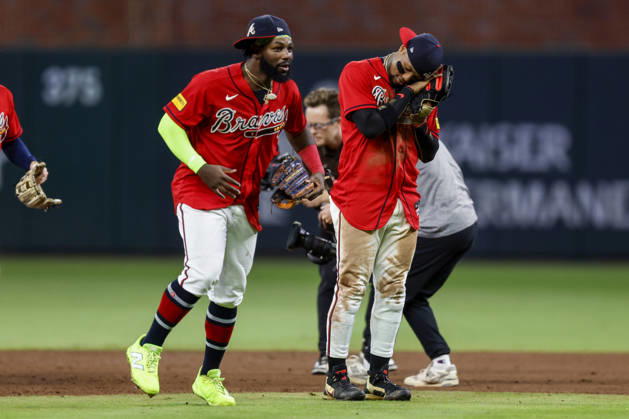Atlanta Braves center fielder Michael Harris II (23) and Atlanta Braves right fielder Ronald Acuna Jr. (13) celebrate after defeating the Philadelphia Phillies in game three of the MLB, Baseball Herren, USA National League Wild Card round at Truist Park in Atlanta, Georgia on Thursday, October 1, 2026. ATL20261001341 MIKExZARRILLI
