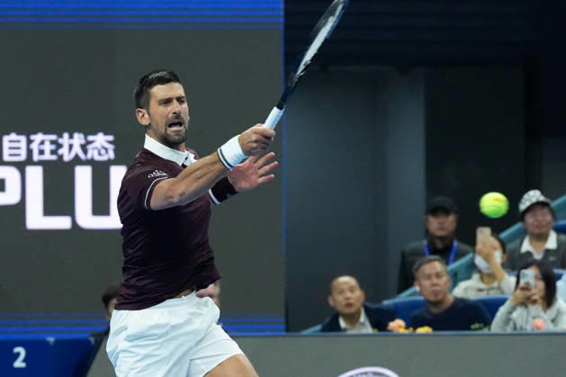 (261002) -- BEIJING, Oct. 2, 2026 -- Novak Djokovic of Serbia hits a return during the men s singles second round match between Bu Yunchaokete of China and Novak Djokovic of Serbia at 2026 China Open tennis tournament in Beijing, China, Oct. 2, 2026. ) (SP)CHINA-BEIJING-TENNIS-CHINA OPEN-MEN S SINGLES(CN) JuxHuanzong