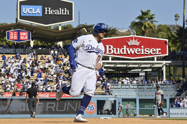 Los Angeles Dodgers Max Muncy hits a solo home run in the sixth inning against the Atlanta Braves in game one of the National League Division Series at Dodger Stadium on Saturday, October 3, 2026 in Los Angeles, California. LAP202610033051 JIMxRUYMEN