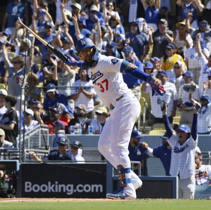 Los Angeles Dodgers Teoscar Hernandez celebrates after hitting a 2-run home run in the fourth inning off Atlanta Braves reliever Victor Mederos in game one of the National League Division Series at Dodger Stadium on Saturday, October 3, 2026 in Los Angeles, California. LAP20261003803 JIMxRUYMEN