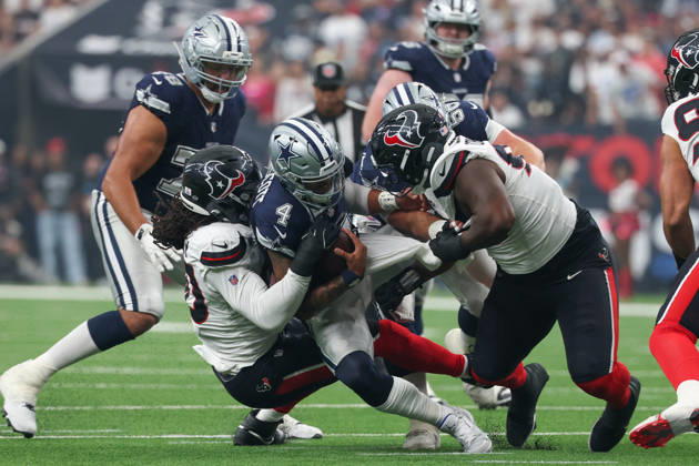 HOUSTON, TX - OCTOBER 04: Quarterback Dak Prescott 4 of the Dallas Cowboys is sacked by defensive end Jadeveon Clowney 90 of the Houston Texans during the NFL, American Football Herren, USA football game between the Houston Texans and Dallas Cowboys on October 4, 2026, at Reliant Stadium in Houston, TX. (Photo by David Buono Icon Sportswire) NFL: OCT 04 Cowboys at Texans EDITORIAL USE ONLY Icon241004012