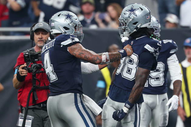 HOUSTON, TX - OCTOBER 04: Quarterback Dak Prescott 4 of the Dallas Cowboys and wide receiver Ceedee Lamb 88 of the Dallas Cowboys celebrate a game winning touchdown in the last minute of the NFL, American Football Herren, USA football game between the Houston Texans and Dallas Cowboys on October 4, 2026, at Reliant Stadium in Houston, TX. (Photo by David Buono Icon Sportswire) NFL: OCT 04 Cowboys at Texans EDITORIAL USE ONLY Icon241004050