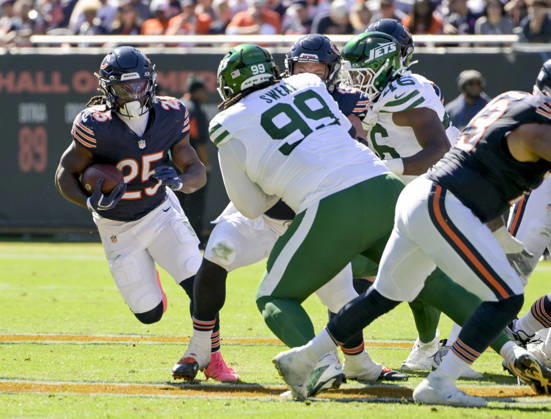 Chicago Bears running back Kyle Monangai (25) runs the ball against the New York Jets at Soldier Field in Chicago on Sunday, October 4, 2026. CHI20261004139 MARKxBLACK