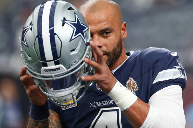 HOUSTON, TX - OCTOBER 04: Quarterback Dak Prescott 4 of the Dallas Cowboys readies to put his helmet on during warmups ahead of the NFL, American Football Herren, USA football game between the Houston Texans and Dallas Cowboys on October 4, 2026, at Reliant Stadium in Houston, TX. (Photo by David Buono Icon Sportswire) NFL: OCT 04 Cowboys at Texans EDITORIAL USE ONLY Icon241004076