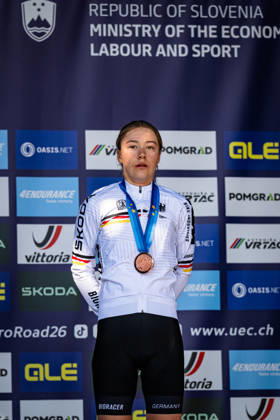 DWORATZEK Klara: UEC Road cycling, Rad, Radsport, Strasse European Championships - Ljubljana 2026 DWORATZEK Klara ( GER ) Germany Third Place - Award Ceremony Medal Ceremony Podium - Hochformat hoch vertikal Portrait - Event Veranstaltung: UEC Road Cycling European Championships 2026 Ljubljana - Category Kategorie: Cycling - Road Cycling European Championships - Road Race Junior Women U19 - Location Ort: Europe Slovenia - Sencur - Å enÄur - Discipline: Road Race ( RR ) - Distance: 66,3 km - Date Datum: 04.10.2026 Sunday Day 3 -