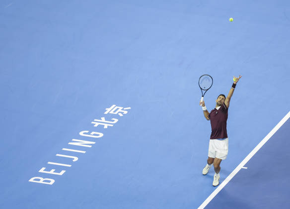 (261006) -- BEIJING, Oct. 6, 2026 -- Novak Djokovic of Serbia serves during the men s singles final match against Alex de Minaur of Australia at 2026 China Open tennis tournament in Beijing, China, Oct. 6, 2026. ) (SP)CHINA-BEIJING-TENNIS-CHINA OPEN-MEN S SINGLES-FINAL(CN) BaixXuefei