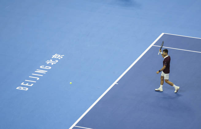 (261006) -- BEIJING, Oct. 6, 2026 -- Novak Djokovic of Serbia waves to spectators during the men s singles final match against Alex de Minaur of Australia at 2026 China Open tennis tournament in Beijing, China, Oct. 6, 2026. ) (SP)CHINA-BEIJING-TENNIS-CHINA OPEN-MEN S SINGLES-FINAL(CN) BaixXuefei