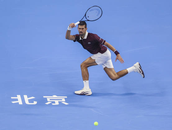 (261006) -- BEIJING, Oct. 6, 2026 -- Novak Djokovic of Serbia hits a return during the men s singles final match against Alex de Minaur of Australia at 2026 China Open tennis tournament in Beijing, China, Oct. 6, 2026. (Photo by Xinhua) (SP)CHINA-BEIJING-TENNIS-CHINA OPEN-MEN S SINGLES-FINAL(CN) MaxZihan
