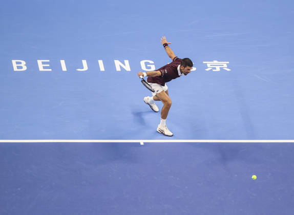 (261006) -- BEIJING, Oct. 6, 2026 -- Novak Djokovic of Serbia hits a return during the men s singles final match against Alex de Minaur of Australia at 2026 China Open tennis tournament in Beijing, China, Oct. 6, 2026. (Photo by Xinhua) (SP)CHINA-BEIJING-TENNIS-CHINA OPEN-MEN S SINGLES-FINAL(CN) MaxZihan