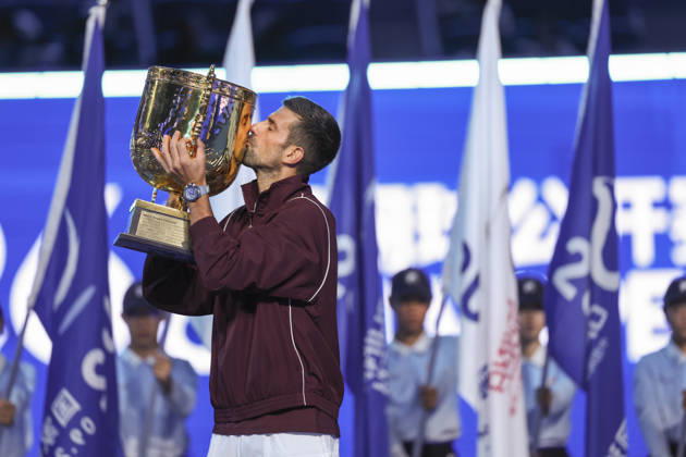 (261006) -- BEIJING, Oct. 6, 2026 -- Winner Novak Djokovic of Serbia kisses the trophy during the awarding ceremony for the men s singles final at 2026 China Open tennis tournament in Beijing, China, Oct. 6, 2026. ) (SP)CHINA-BEIJING-TENNIS-CHINA OPEN-MEN S SINGLES-AWARDING CEREMONY(CN) BaixXuefei