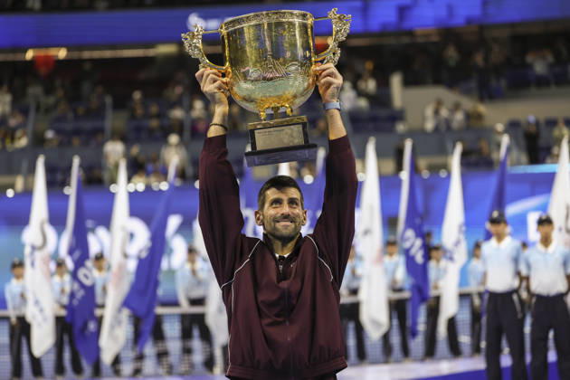 (261006) -- BEIJING, Oct. 6, 2026 -- Novak Djokovic of Serbia holds up the champion trophy during the awarding ceremony for the men s singles final at 2026 China Open tennis tournament in Beijing, China, Oct. 6, 2026. ) (SP)CHINA-BEIJING-TENNIS-CHINA OPEN-MEN S SINGLES-AWARDING CEREMONY(CN) BaixXuefei