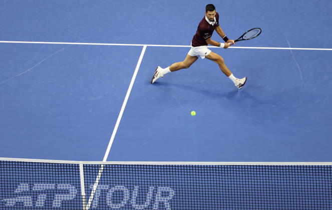 (261006) -- BEIJING, Oct. 6, 2026 -- Novak Djokovic of Serbia hits a return during the men s singles final against Alex de Minaur of Australia at 2026 China Open tennis tournament in Beijing, China, Oct. 6, 2026. ) (SP)CHINA-BEIJING-TENNIS-CHINA OPEN-MEN S SINGLES-FINAL(CN) ZhangxChenlin