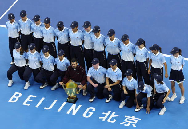 (261006) -- BEIJING, Oct. 6, 2026 -- Winner Novak Djokovic of Serbia poses with ball kids after the awarding ceremony for the men s singles final at 2026 China Open tennis tournament in Beijing, China, Oct. 6, 2026. ) (SP)CHINA-BEIJING-TENNIS-CHINA OPEN-MEN S SINGLES-AWARDING CEREMONY(CN) ZhangxChenlin