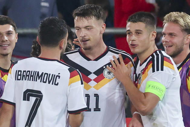 Dzenan Pejcinovic (Germany) celebrates after scoring his teams second goal with Arijon Ibrahimovic (Germany) and Nicolo Tresoldi (Germany) during the UEFA Under21 EURO Qualifier, EM, Europameisterschaft between Germany U21, U 21 and Georgia U21 at Almstadion on October 6, 2026 in Bielefeld, Germany. (Photo by Marco Steinbrenner DeFodi Images) -