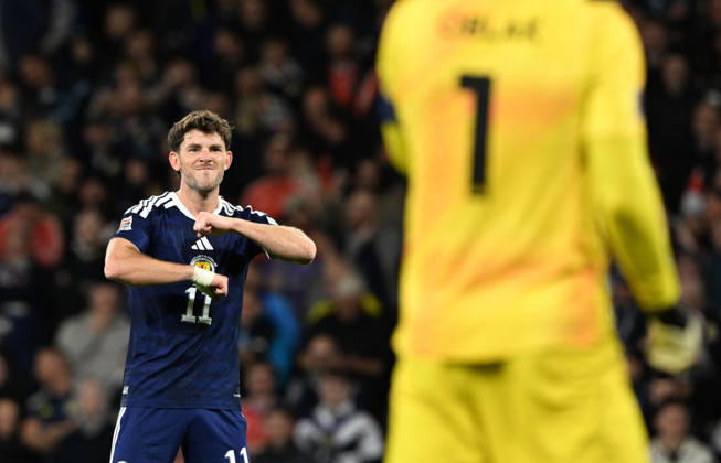 Glasgow, Scotland, 6th October 2026. Ryan Christie of Scotland scores the opening goal during the Scotland vs Slovenia UEFA Nations League match at Hampden Park, Glasgow. Picture credit should read: Neil Hanna Sportimage EDITORIAL USE ONLY. No use with unauthorised audio, video, data, fixture lists, club league logos or live services. Online in-match use limited to 120 images, no video emulation. No use in betting, games or single club league player publications. SPI_020_NH_Scotland_Slovenia SPI-5054-0020