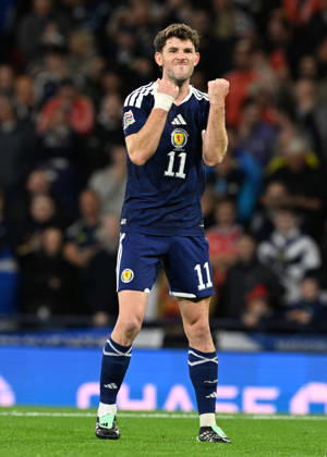 Glasgow, Scotland, 6th October 2026. Ryan Christie of Scotland scores the opening goal during the Scotland vs Slovenia UEFA Nations League match at Hampden Park, Glasgow. Picture credit should read: Neil Hanna Sportimage EDITORIAL USE ONLY. No use with unauthorised audio, video, data, fixture lists, club league logos or live services. Online in-match use limited to 120 images, no video emulation. No use in betting, games or single club league player publications. SPI_021_NH_Scotland_Slovenia SPI-5054-0021