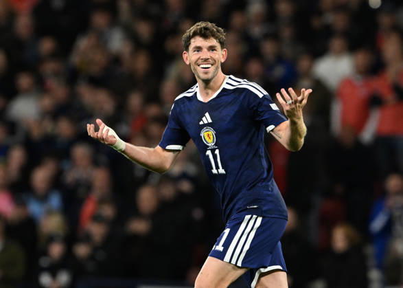 Glasgow, Scotland, 6th October 2026. Ryan Christie of Scotland scores the opening goal during the Scotland vs Slovenia UEFA Nations League match at Hampden Park, Glasgow. Picture credit should read: Neil Hanna Sportimage EDITORIAL USE ONLY. No use with unauthorised audio, video, data, fixture lists, club league logos or live services. Online in-match use limited to 120 images, no video emulation. No use in betting, games or single club league player publications. SPI_024_NH_Scotland_Slovenia SPI-5054-0024