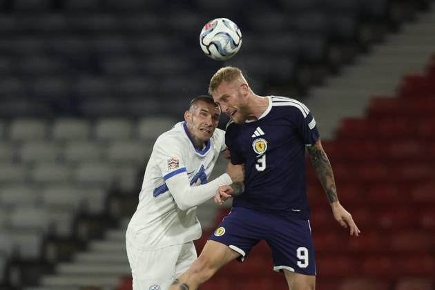 RECORD DATE NOT STATED 6th October 2026; Hampden Park, Glasgow, Scotland; UEFA Nations League Football, Scotland versus Slovenia; Oli McBurnie of Scotland competes in the air with David Zec of Slovenia DavidxYoung
