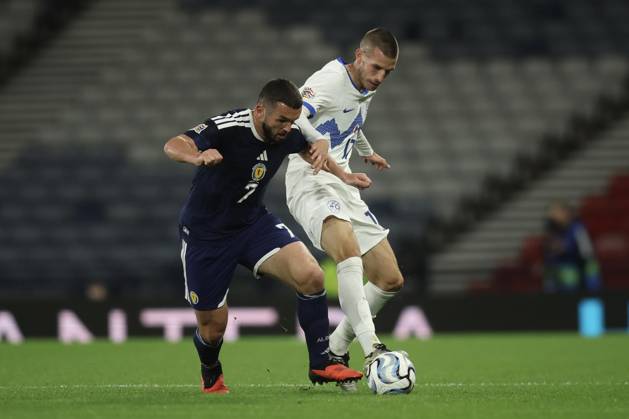 RECORD DATE NOT STATED 6th October 2026; Hampden Park, Glasgow, Scotland; UEFA Nations League Football, Scotland versus Slovenia; John McGinn of Scotland challenges for the ball with David Zec of Slovenia DavidxYoung