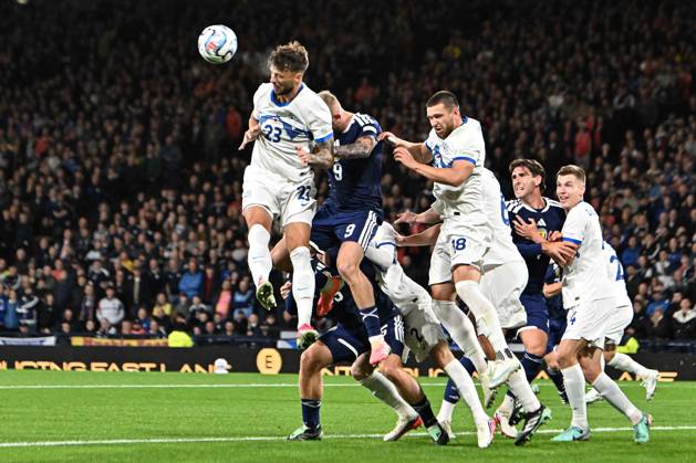 Scotland v Slovenia UEFA Nations League Oli McBurnie of Scotland battles for the ball with David Brekalo of Slovenia in the air during the UEFA Nations League match at Barclays Hampden, Glasgow 06 10 2026 UK Newspapers OUT Copyright: xJamiexJohnstonx FIL-24032-0090