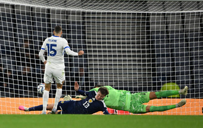 Glasgow, Scotland, 6th October 2026. Danijel Strum of Slovenia scores his sides 2nd goal during the Scotland vs Slovenia UEFA Nations League match at Hampden Park, Glasgow. Picture credit should read: Neil Hanna Sportimage EDITORIAL USE ONLY. No use with unauthorised audio, video, data, fixture lists, club league logos or live services. Online in-match use limited to 120 images, no video emulation. No use in betting, games or single club league player publications. SPI_041_NH_Scotland_Slovenia SPI-5054-0040