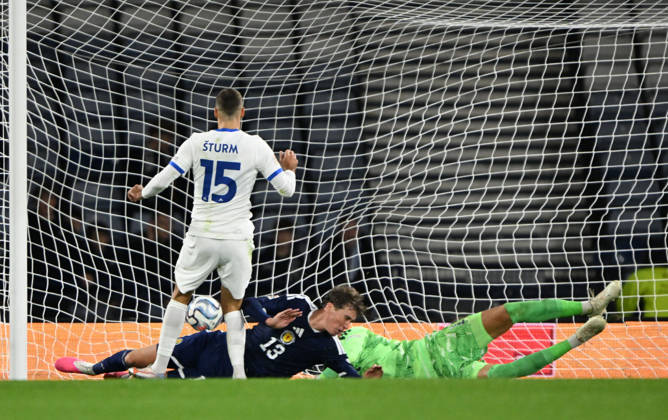 Glasgow, Scotland, 6th October 2026. Danijel Strum of Slovenia scores his sides 2nd goal during the Scotland vs Slovenia UEFA Nations League match at Hampden Park, Glasgow. Picture credit should read: Neil Hanna Sportimage EDITORIAL USE ONLY. No use with unauthorised audio, video, data, fixture lists, club league logos or live services. Online in-match use limited to 120 images, no video emulation. No use in betting, games or single club league player publications. SPI_042_NH_Scotland_Slovenia SPI-5054-0041