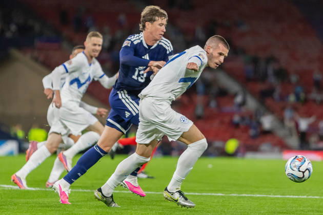 Scotland v Slovenia, UEFA Nations League Jack Hendry of Scotland national team, Nationalteam is held off by David Zec of Slovenia during the UEFA Nations League League B Group B1 between Scotland and Slovenia. Barclays Hampden, Hampden Park, Glasgow, Scotland. 6 October 2026. Hampden Park Barclays Hampden Glasgow Scotland Editorial use only , Copyright: xColinxPoultneyx PSI-24964-0038
