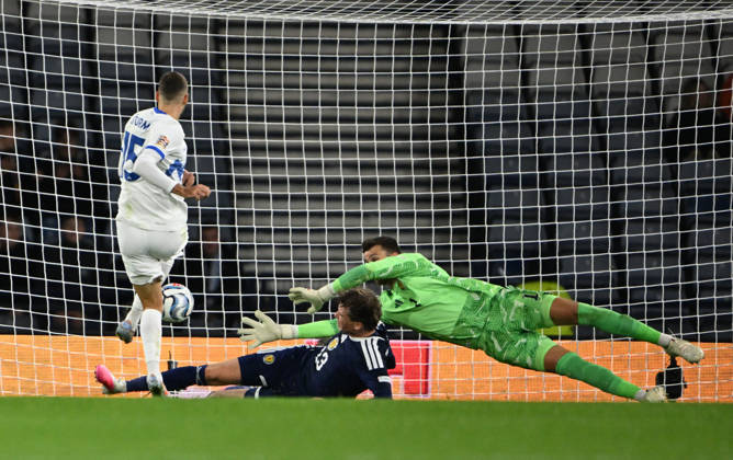 Glasgow, Scotland, 6th October 2026. Danijel Strum of Slovenia scores his sides 2nd goal during the Scotland vs Slovenia UEFA Nations League match at Hampden Park, Glasgow. Picture credit should read: Neil Hanna Sportimage EDITORIAL USE ONLY. No use with unauthorised audio, video, data, fixture lists, club league logos or live services. Online in-match use limited to 120 images, no video emulation. No use in betting, games or single club league player publications. SPI_039_NH_Scotland_Slovenia SPI-5054-0042
