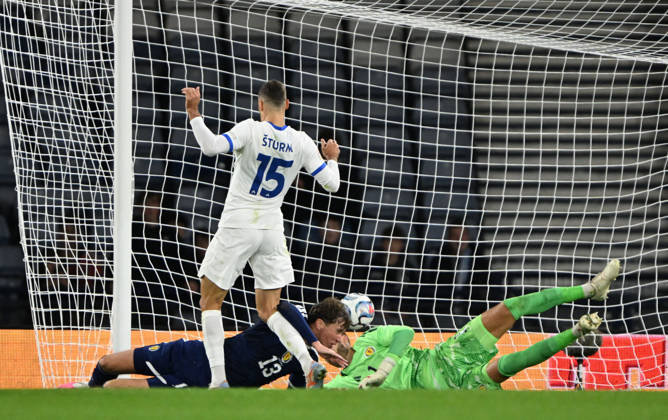 Glasgow, Scotland, 6th October 2026. Danijel Strum of Slovenia scores his sides 2nd goal during the Scotland vs Slovenia UEFA Nations League match at Hampden Park, Glasgow. Picture credit should read: Neil Hanna Sportimage EDITORIAL USE ONLY. No use with unauthorised audio, video, data, fixture lists, club league logos or live services. Online in-match use limited to 120 images, no video emulation. No use in betting, games or single club league player publications. SPI_043_NH_Scotland_Slovenia SPI-5054-0043