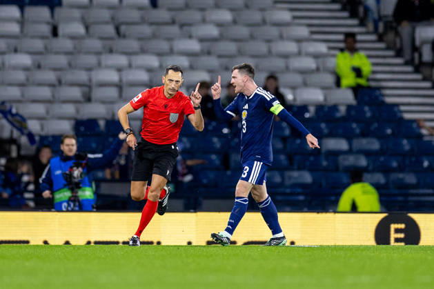 RECORD DATE NOT STATED 6th October 2026; Hampden Park, Glasgow, Scotland; UEFA Nations League Football, Scotland versus Slovenia; Andy Robertson of Scotland speaks to Referee Jose Maria Sanchez after a decision goes against Scotland VagelisxGeorgariou