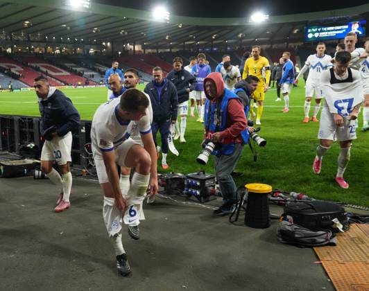Slovenia players remove their jerseys and shorts amid celebratons at full-time. Final score Scotland 1 Slovenia 2. Scotland v Slovenia, Football, UEFA Nation s League, Group B1, Hampden Park, Glasgow, UK, Hampden Park, Glasgow, Scotland, Scotland, UK - 06 Oct 2026Glasgow Hampden Park Scotland United Kingdom Copyright: xStuartxWallace Shutterstockx 17189021bo